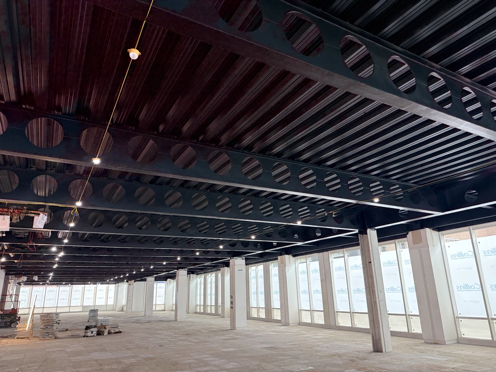 Sprayed black finish to exposed structural steelwork and cellular beams
